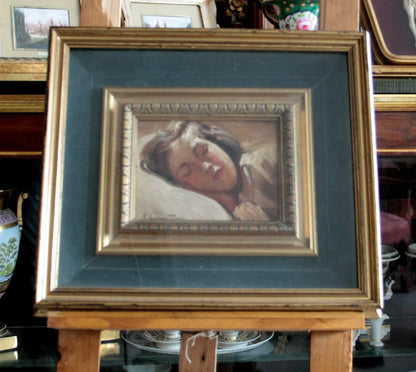 Framed painting of a sleeping woman titled bambina dormiente by francesco galante signed opera