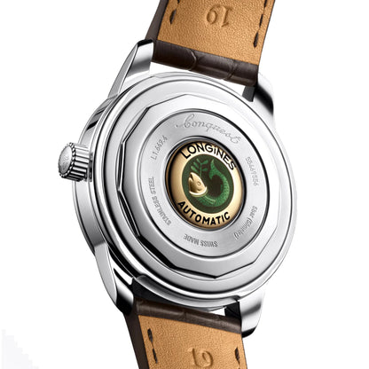Parte posteriore di longines orologio heritage 38mm marrone acciaio automatico con emblema inciso di pesce verde protetto dall’ufficio federale svizzero