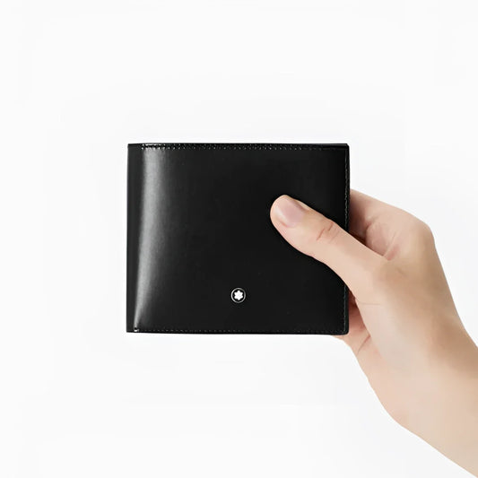 Portafoglio montblanc meisterstück nero in vitello pieno fiore con fodera jacquard e logo inciso al centro